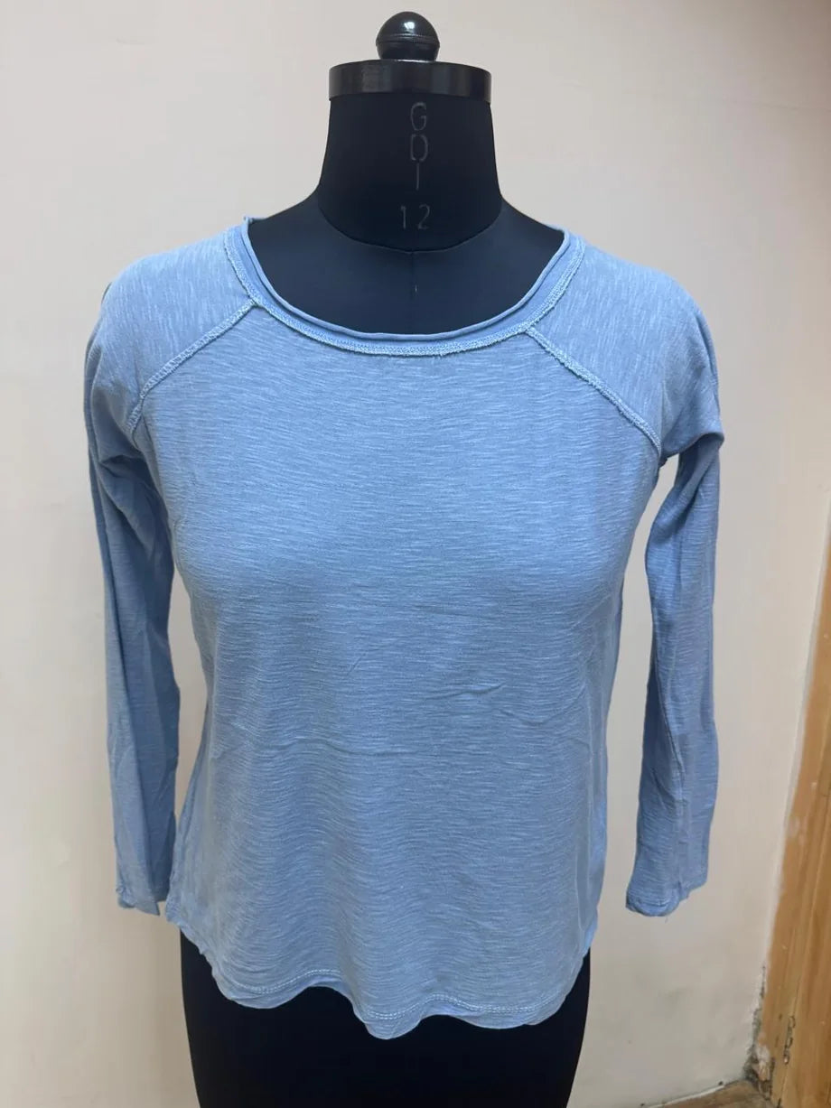 The Grey Lane Blue relaxed long-sleeve tee — original garment photograph